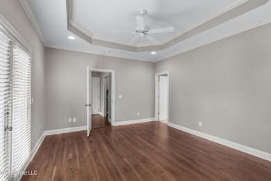 Welcome to this fantastic home on a spacious corner lot, just on Lake Caroline Golf Club in Mississippi - for sale on GolfHomes.com, golf home, golf lot