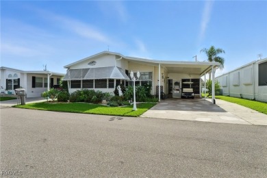 This Home is Truly Special! It starts with a Butterfly Garden on Riverbend Golf and Country Club in Florida - for sale on GolfHomes.com, golf home, golf lot