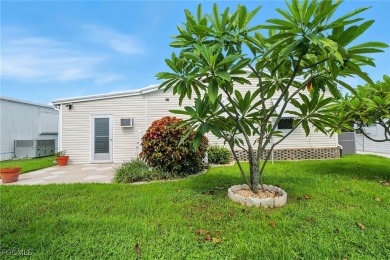 This Home is Truly Special! It starts with a Butterfly Garden on Riverbend Golf and Country Club in Florida - for sale on GolfHomes.com, golf home, golf lot