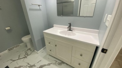 Welcome home to this Beautiful updated 4 bedroom, 2 bath home on Lakes of the Four Seasons Country Club in Indiana - for sale on GolfHomes.com, golf home, golf lot