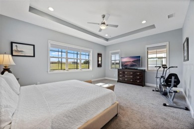 Under contract-accepting backup offers. LUXURY HOME ON A PREMIUM on Eagle Creek Golf Club in Florida - for sale on GolfHomes.com, golf home, golf lot