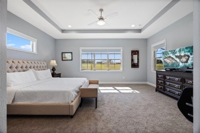 Under contract-accepting backup offers. LUXURY HOME ON A PREMIUM on Eagle Creek Golf Club in Florida - for sale on GolfHomes.com, golf home, golf lot