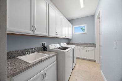 Under contract-accepting backup offers. LUXURY HOME ON A PREMIUM on Eagle Creek Golf Club in Florida - for sale on GolfHomes.com, golf home, golf lot