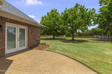 Welcome to this fantastic home on a spacious corner lot, just on Lake Caroline Golf Club in Mississippi - for sale on GolfHomes.com, golf home, golf lot