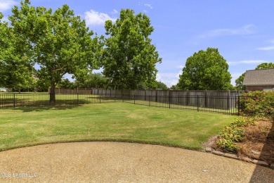 Welcome to this fantastic home on a spacious corner lot, just on Lake Caroline Golf Club in Mississippi - for sale on GolfHomes.com, golf home, golf lot