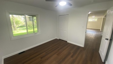 Welcome home to this Beautiful updated 4 bedroom, 2 bath home on Lakes of the Four Seasons Country Club in Indiana - for sale on GolfHomes.com, golf home, golf lot