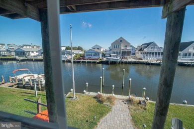 Waterfront coastal contemporary on a wide lagoon to Big on Bayside Resort Golf Club in Delaware - for sale on GolfHomes.com, golf home, golf lot