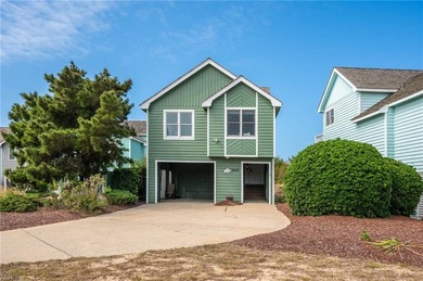 Welcome home to 5010 W Spoon Court, a charming retreat tucked in on Nags Head Golf Links in North Carolina - for sale on GolfHomes.com, golf home, golf lot