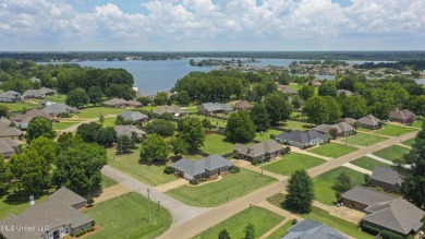 Welcome to this fantastic home on a spacious corner lot, just on Lake Caroline Golf Club in Mississippi - for sale on GolfHomes.com, golf home, golf lot