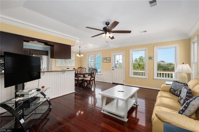 Welcome home to 5010 W Spoon Court, a charming retreat tucked in on Nags Head Golf Links in North Carolina - for sale on GolfHomes.com, golf home, golf lot