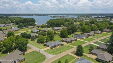 Welcome to this fantastic home on a spacious corner lot, just on Lake Caroline Golf Club in Mississippi - for sale on GolfHomes.com, golf home, golf lot