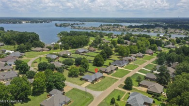 Welcome to this fantastic home on a spacious corner lot, just on Lake Caroline Golf Club in Mississippi - for sale on GolfHomes.com, golf home, golf lot