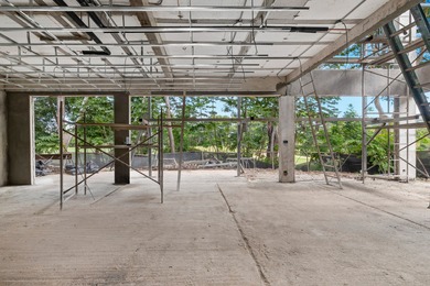 An elegant residence designed around openness, perspective, and on  in  - for sale on GolfHomes.com, golf home, golf lot