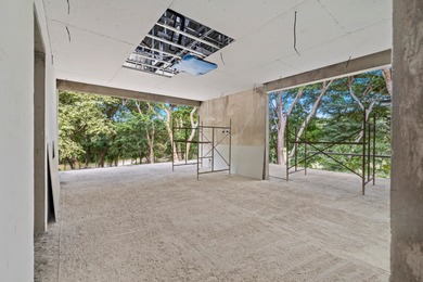 An elegant residence designed around openness, perspective, and on  in  - for sale on GolfHomes.com, golf home, golf lot