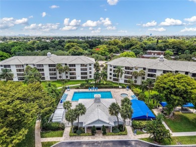 Stunning 2BR/2BA Corner Unit with Golf  Lake Views, Prime Davie on Pine Island Ridge Country Club in Florida - for sale on GolfHomes.com, golf home, golf lot