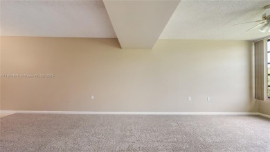 Stunning 2BR/2BA Corner Unit with Golf  Lake Views, Prime Davie on Pine Island Ridge Country Club in Florida - for sale on GolfHomes.com, golf home, golf lot