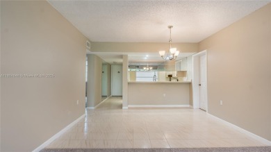 Stunning 2BR/2BA Corner Unit with Golf  Lake Views, Prime Davie on Pine Island Ridge Country Club in Florida - for sale on GolfHomes.com, golf home, golf lot
