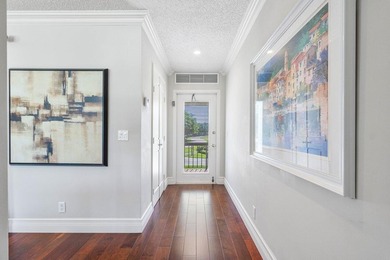 LUSH GOLF VIEWS & RESORT LIVING AT QUAIL RIDGE! Step into this on Quail Ridge Golf Course and Country Club in Florida - for sale on GolfHomes.com, golf home, golf lot