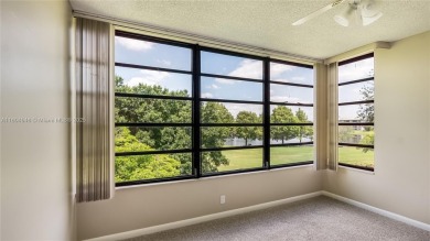 Stunning 2BR/2BA Corner Unit with Golf  Lake Views, Prime Davie on Pine Island Ridge Country Club in Florida - for sale on GolfHomes.com, golf home, golf lot