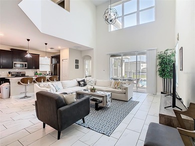 A turn-key, fully furnished ChampionsGate escape offering the on National Golf Course in Florida - for sale on GolfHomes.com, golf home, golf lot