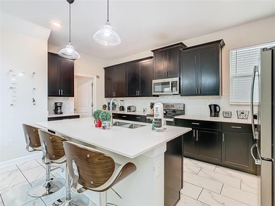 A turn-key, fully furnished ChampionsGate escape offering the on National Golf Course in Florida - for sale on GolfHomes.com, golf home, golf lot