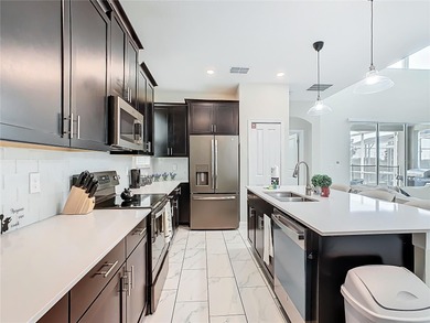 A turn-key, fully furnished ChampionsGate escape offering the on National Golf Course in Florida - for sale on GolfHomes.com, golf home, golf lot