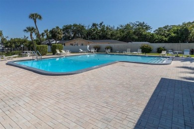 Dont miss this maintenance-free 1 bedroom, 1 bath, cozy, open on Gulf Harbors Golf Course in Florida - for sale on GolfHomes.com, golf home, golf lot
