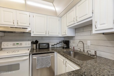 Welcome to your beautiful, turn-key beach escape in Daytona on Oceans Golf Club in Florida - for sale on GolfHomes.com, golf home, golf lot