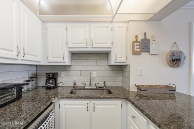 Welcome to your beautiful, turn-key beach escape in Daytona on Oceans Golf Club in Florida - for sale on GolfHomes.com, golf home, golf lot