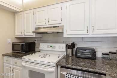Welcome to your beautiful, turn-key beach escape in Daytona on Oceans Golf Club in Florida - for sale on GolfHomes.com, golf home, golf lot