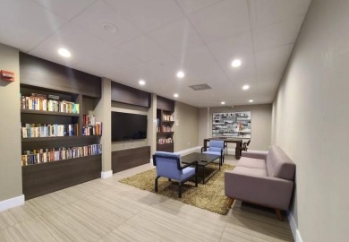 Relax in this fully furnished apt with new hurricane impact on  in Florida - for sale on GolfHomes.com, golf home, golf lot