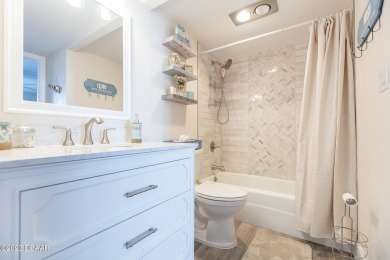 Welcome to your beautiful, turn-key beach escape in Daytona on Oceans Golf Club in Florida - for sale on GolfHomes.com, golf home, golf lot