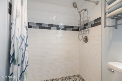 Welcome to your beautiful, turn-key beach escape in Daytona on Oceans Golf Club in Florida - for sale on GolfHomes.com, golf home, golf lot