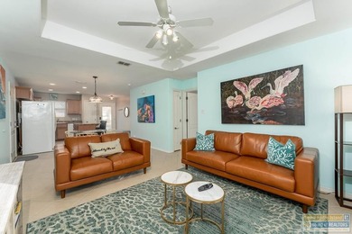 Selling fully furnished and truly turn-key, this stylish coastal on South Padre Island Golf Club in Texas - for sale on GolfHomes.com, golf home, golf lot