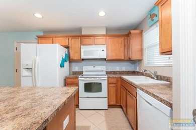 Selling fully furnished and truly turn-key, this stylish coastal on South Padre Island Golf Club in Texas - for sale on GolfHomes.com, golf home, golf lot