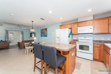 Selling fully furnished and truly turn-key, this stylish coastal on South Padre Island Golf Club in Texas - for sale on GolfHomes.com, golf home, golf lot