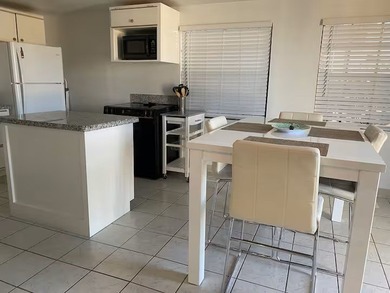 Recently remodeled & fully furnished cottage home with a deck at on Long Island Golf Course in Texas - for sale on GolfHomes.com, golf home, golf lot