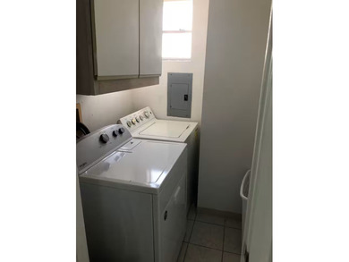 Recently remodeled & fully furnished cottage home with a deck at on Long Island Golf Course in Texas - for sale on GolfHomes.com, golf home, golf lot