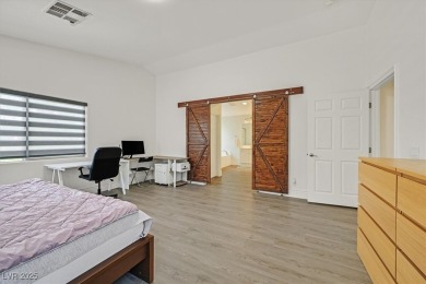 Beautifully remodeled 4-bedroom home in guard-gated Rhodes Ranch on Rhodes Ranch Golf Club in Nevada - for sale on GolfHomes.com, golf home, golf lot