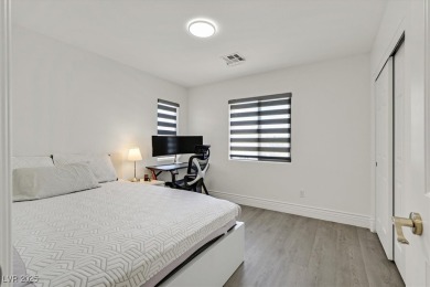 Beautifully remodeled 4-bedroom home in guard-gated Rhodes Ranch on Rhodes Ranch Golf Club in Nevada - for sale on GolfHomes.com, golf home, golf lot