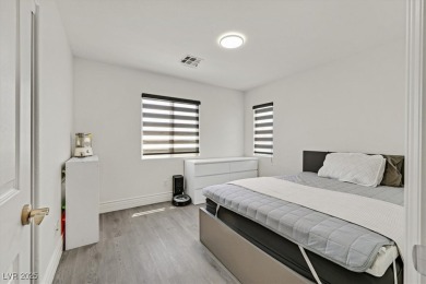 Beautifully remodeled 4-bedroom home in guard-gated Rhodes Ranch on Rhodes Ranch Golf Club in Nevada - for sale on GolfHomes.com, golf home, golf lot