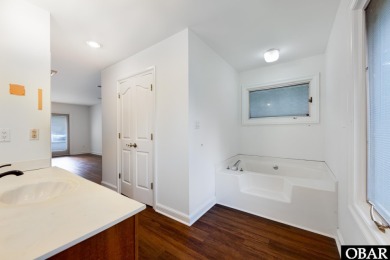 Incredible opportunity to own a canalfront home with beautiful on Duck Woods Country Club in North Carolina - for sale on GolfHomes.com, golf home, golf lot