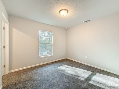 One or more photo(s) has been virtually staged. Experience the on Citrus Springs Country Club in Florida - for sale on GolfHomes.com, golf home, golf lot