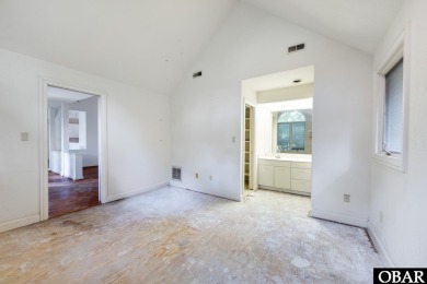 Incredible opportunity to own a canalfront home with beautiful on Duck Woods Country Club in North Carolina - for sale on GolfHomes.com, golf home, golf lot