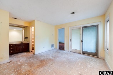 Incredible opportunity to own a canalfront home with beautiful on Duck Woods Country Club in North Carolina - for sale on GolfHomes.com, golf home, golf lot