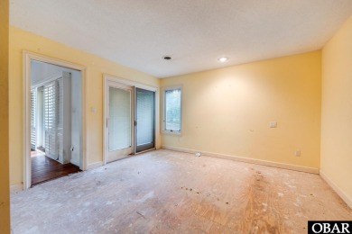 Incredible opportunity to own a canalfront home with beautiful on Duck Woods Country Club in North Carolina - for sale on GolfHomes.com, golf home, golf lot