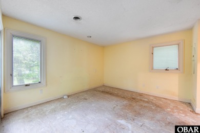 Incredible opportunity to own a canalfront home with beautiful on Duck Woods Country Club in North Carolina - for sale on GolfHomes.com, golf home, golf lot