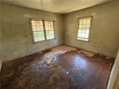 Charming East Lake Bungalow - Ideal for First-Time Buyers or on Charlie Yates Golf Course in Georgia - for sale on GolfHomes.com, golf home, golf lot