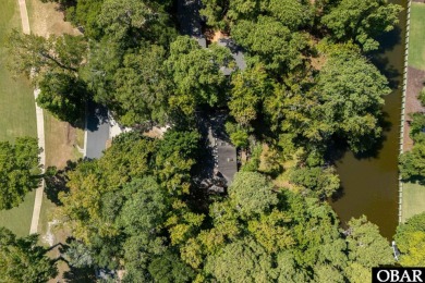 Incredible opportunity to own a canalfront home with beautiful on Duck Woods Country Club in North Carolina - for sale on GolfHomes.com, golf home, golf lot