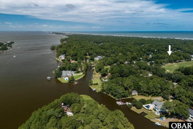 Incredible opportunity to own a canalfront home with beautiful on Duck Woods Country Club in North Carolina - for sale on GolfHomes.com, golf home, golf lot